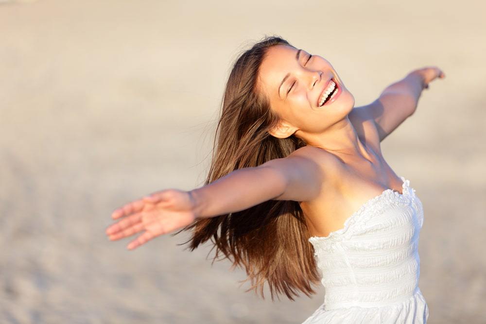 happy woman enjoying her holistic approach to health