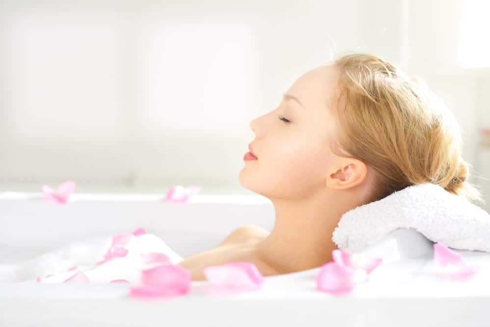 relaxing bath in pure rose essential oil